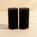 Two Ember Pro replacement black bristle roller heads